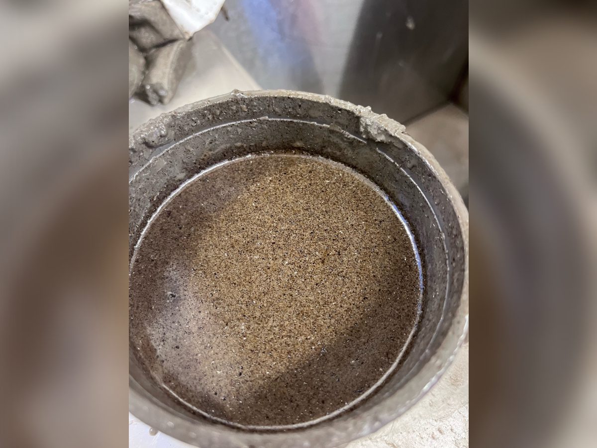 A close up of the bottom of a coffee pot
